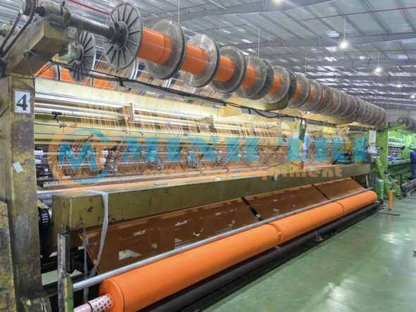 máy sản xuất lưới bao che cam